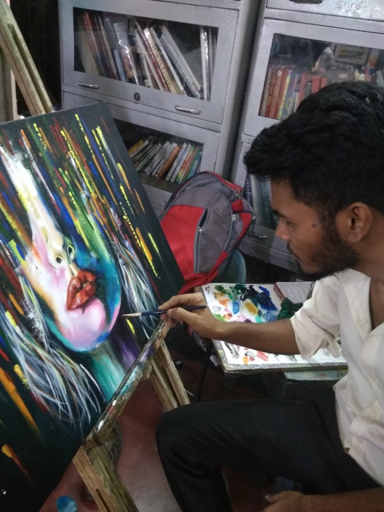 Deepak Kumar Shakya — portrait artist at his Delhi studio in Patel Nagar