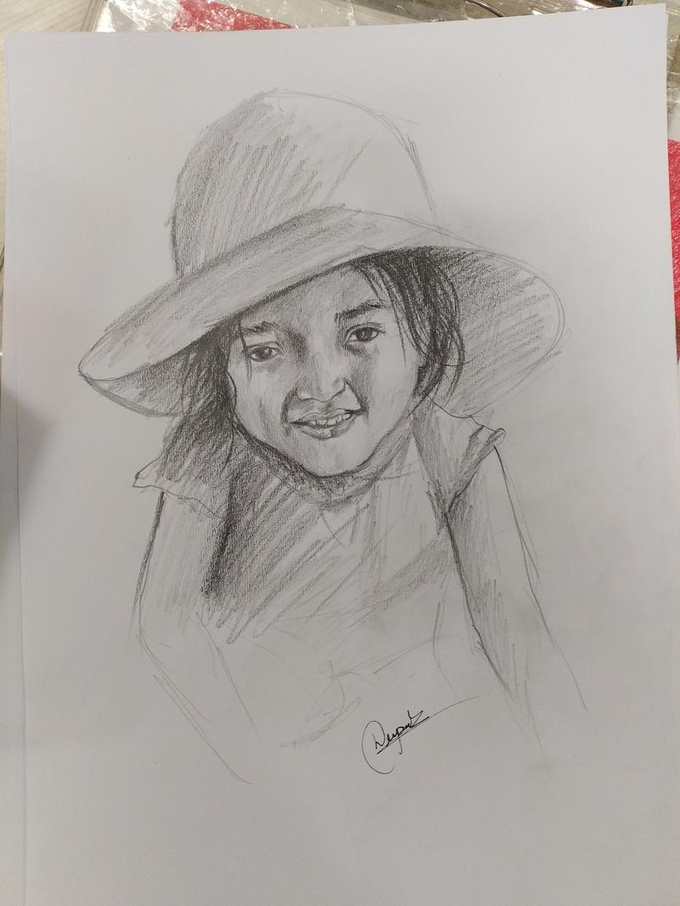 Child portrait pencil sketch with hat by Deepak - artist Delhi